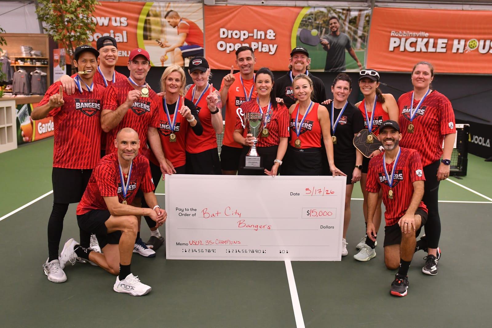 BCB squad with trophy and $15K prize check